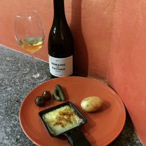 Raclette con vino bianco